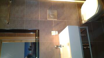 Superior Studio | Bathroom | Shower, free toiletries, hair dryer, towels