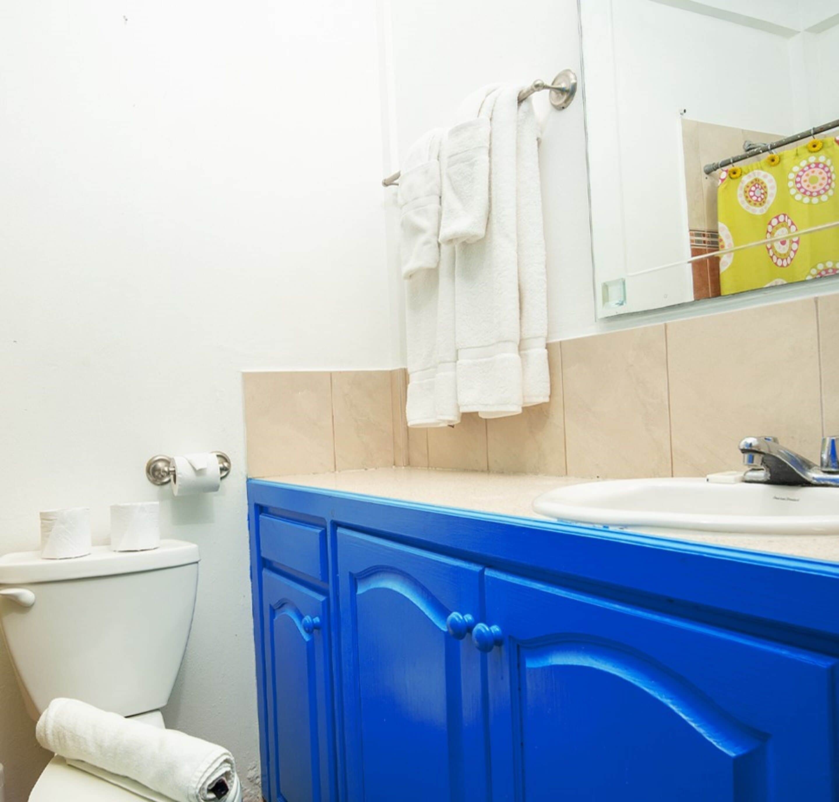 economy double or twin room, 1 bedroom, kitchenette | bathroom | shower, towels