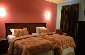 Room, Private Bathroom (standard Room) | In-room safe, individually decorated, individually furnished, desk