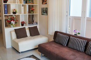 3-Bedroom House | Living room | Flat-screen TV, DVD player