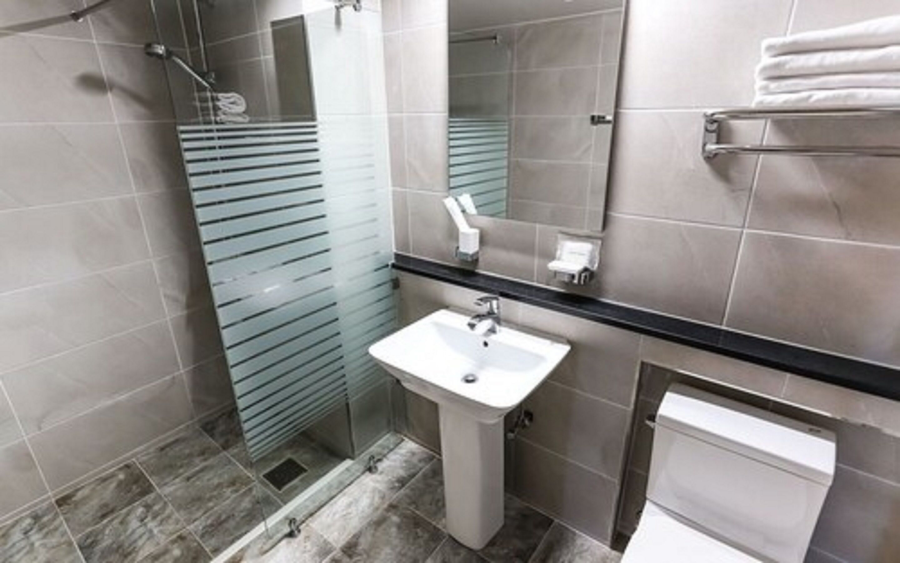 deluxe triple room, mountain view | bathroom | shower, free toiletries, hair dryer, slippers