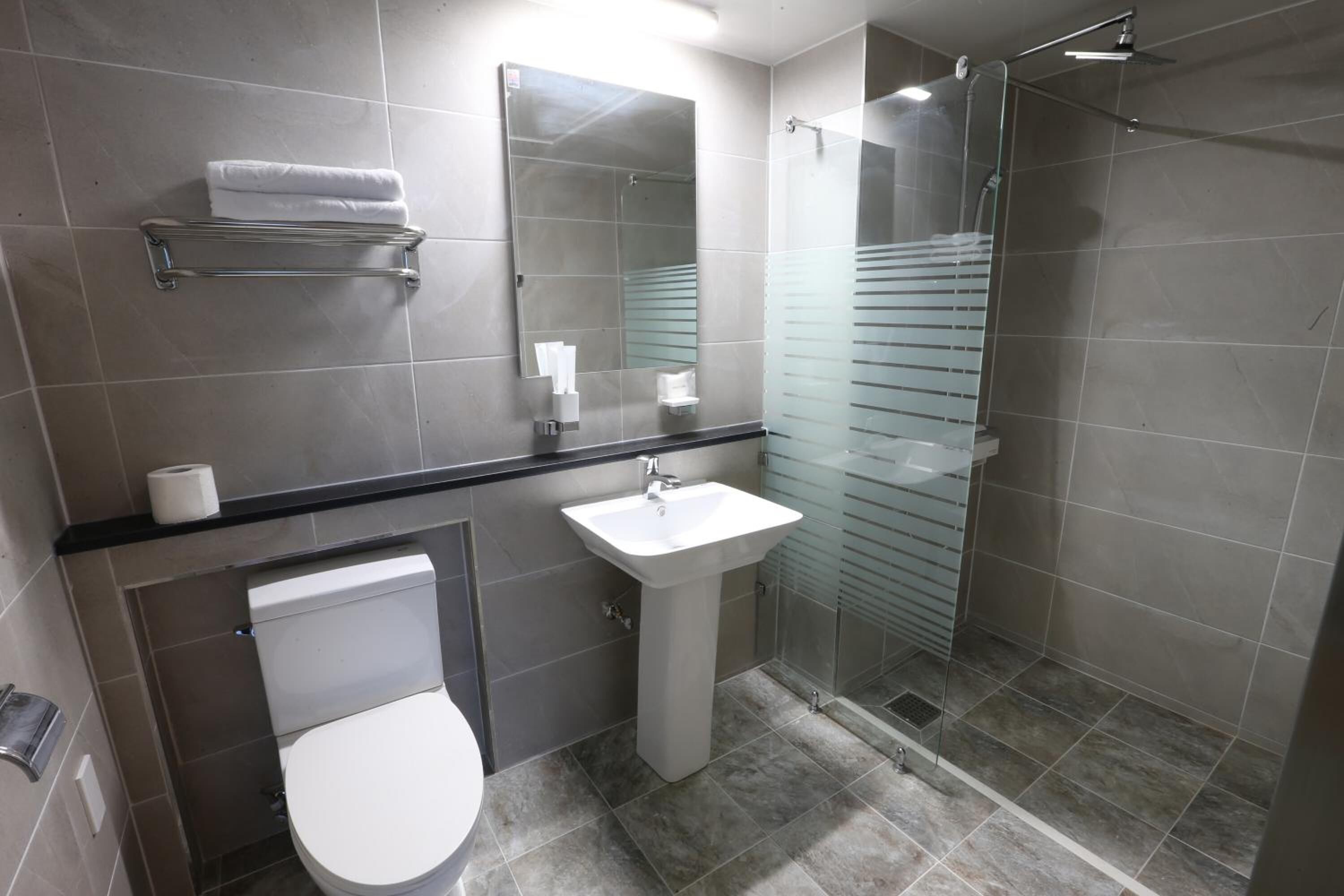 shower, free toiletries, hair dryer, slippers