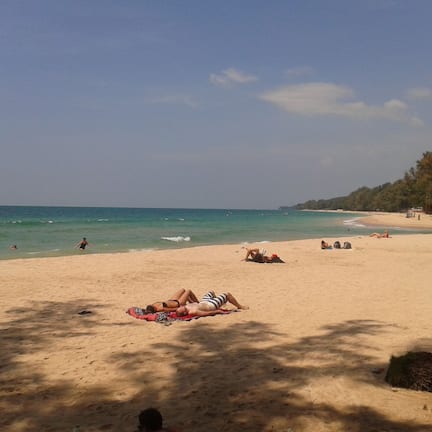On the beach, sun loungers, beach umbrellas, beach towels