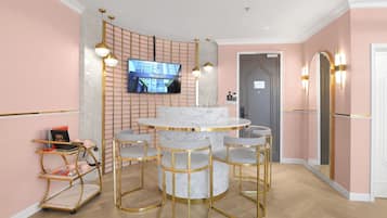 Diva Family Suite | Living area | 50-inch LCD TV with satellite channels, TV