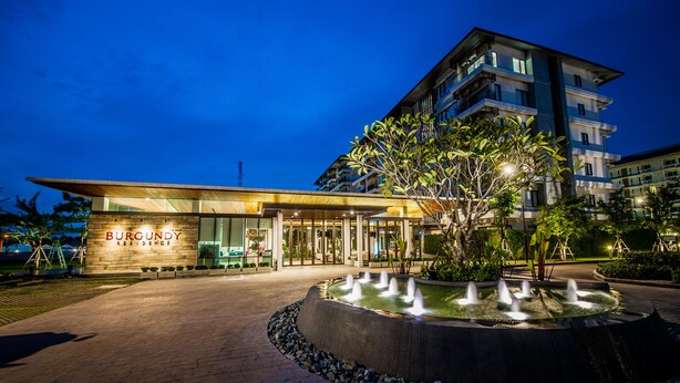 A modern building with a sign reading "BURGUNDY RESIDENCE". - Burgundy Residence (Si Maha Phot)