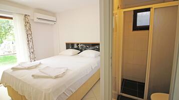 Room, Garden View, Ground Floor | Minibar, free WiFi, bed sheets