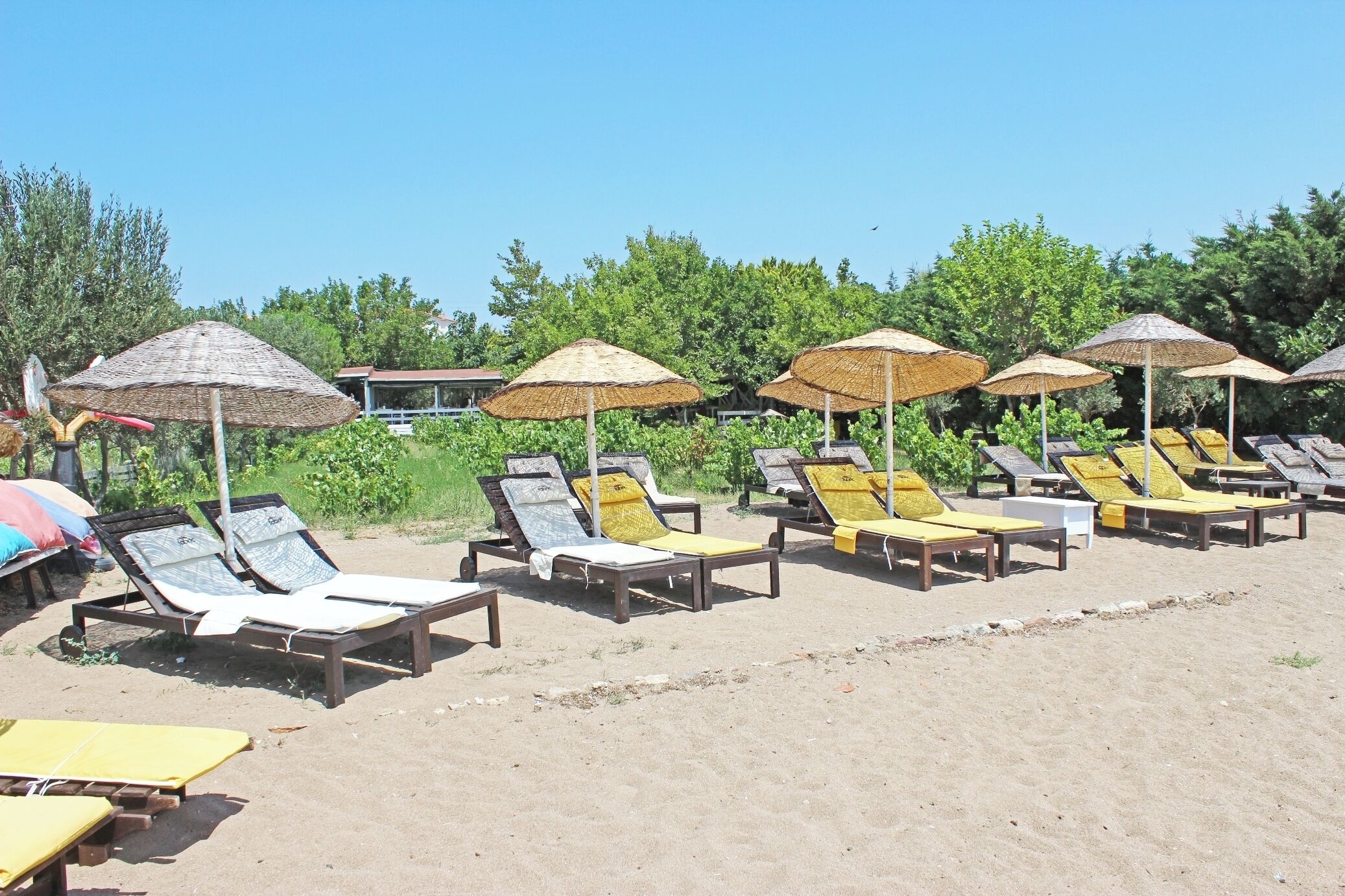 private beach, sun-loungers, beach umbrellas