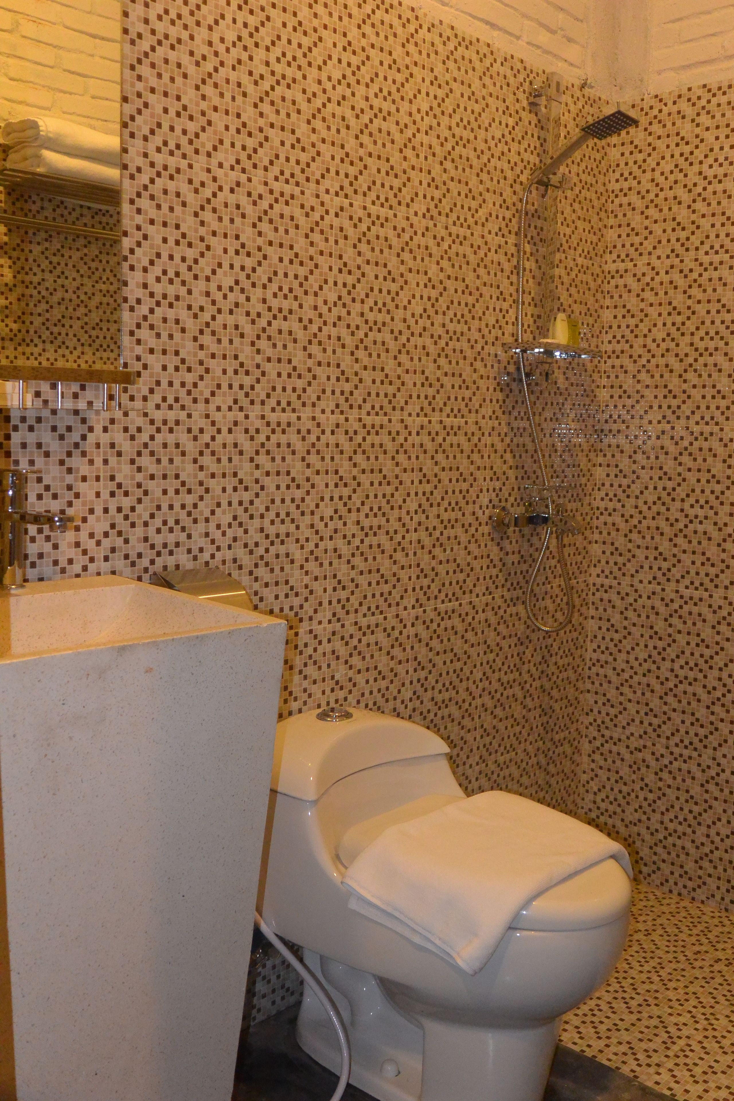 superior twin room | bathroom | shower, free toiletries, hair dryer, slippers