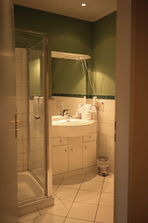 Shower, free toiletries, hair dryer, towels