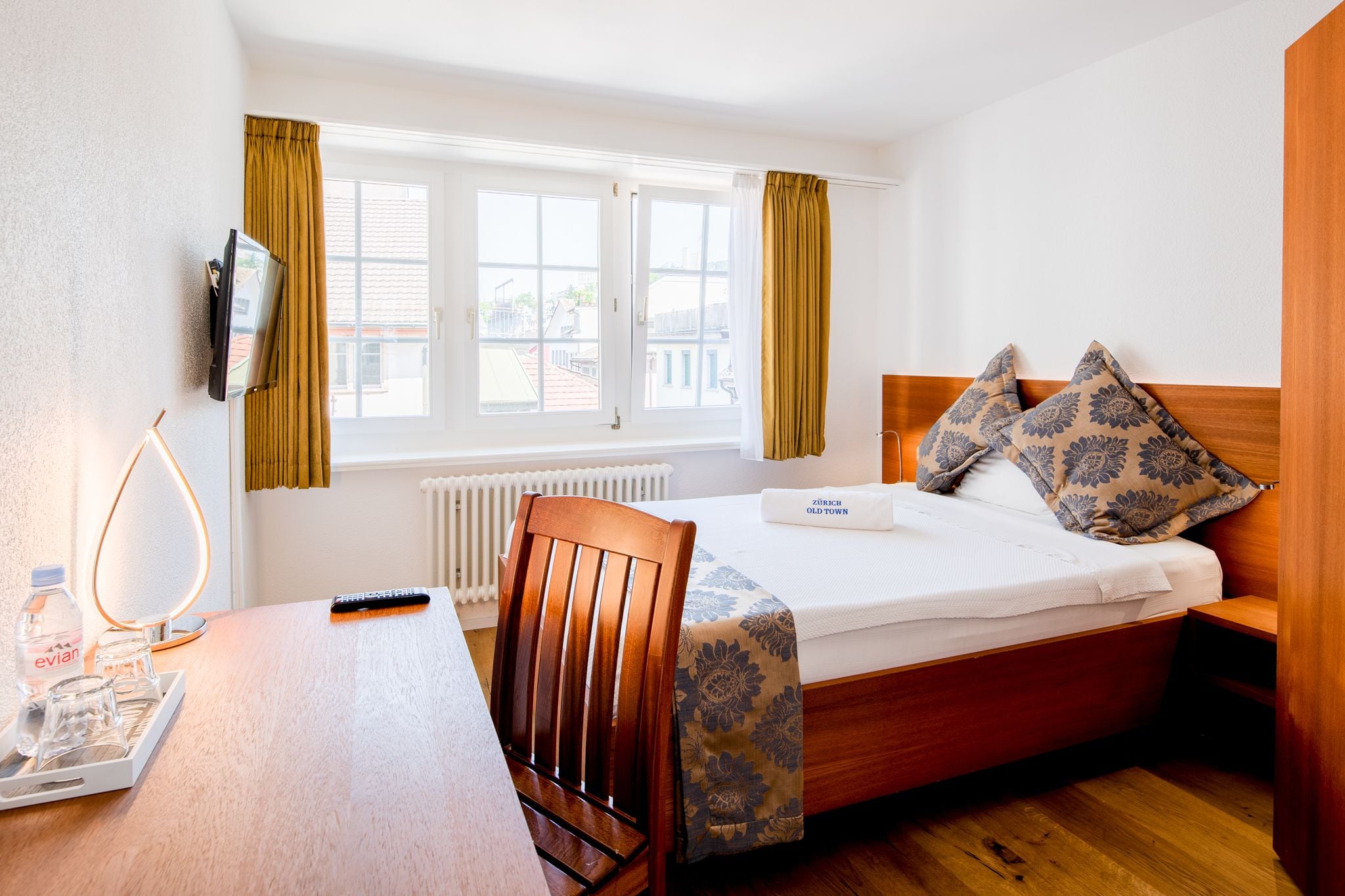 premium bedding, down duvets, minibar, in-room safe