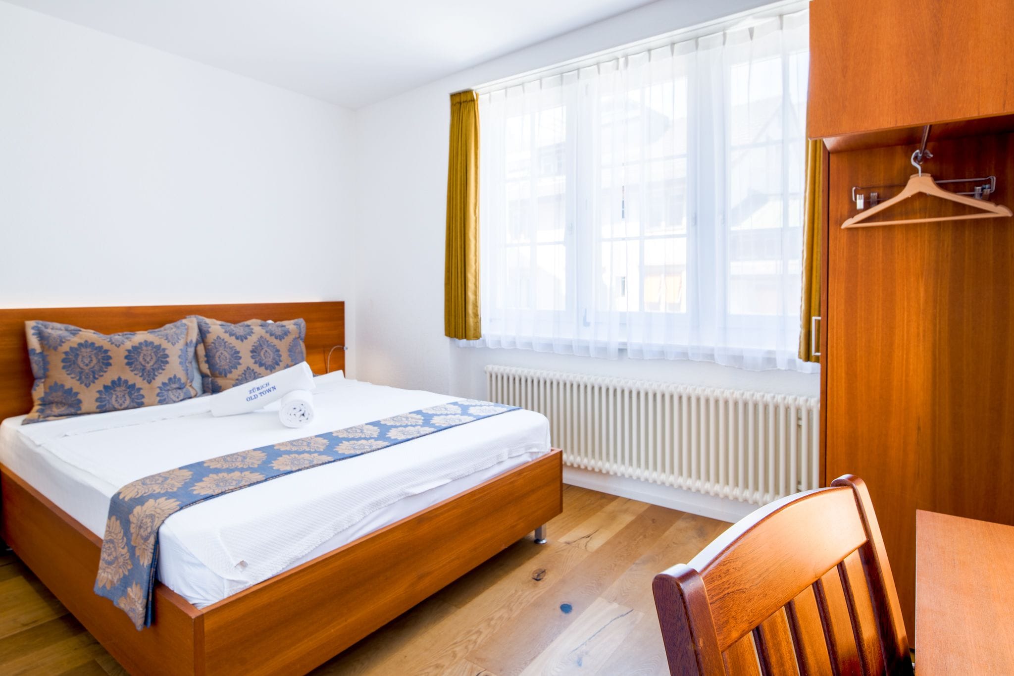 premium bedding, down duvets, minibar, in-room safe