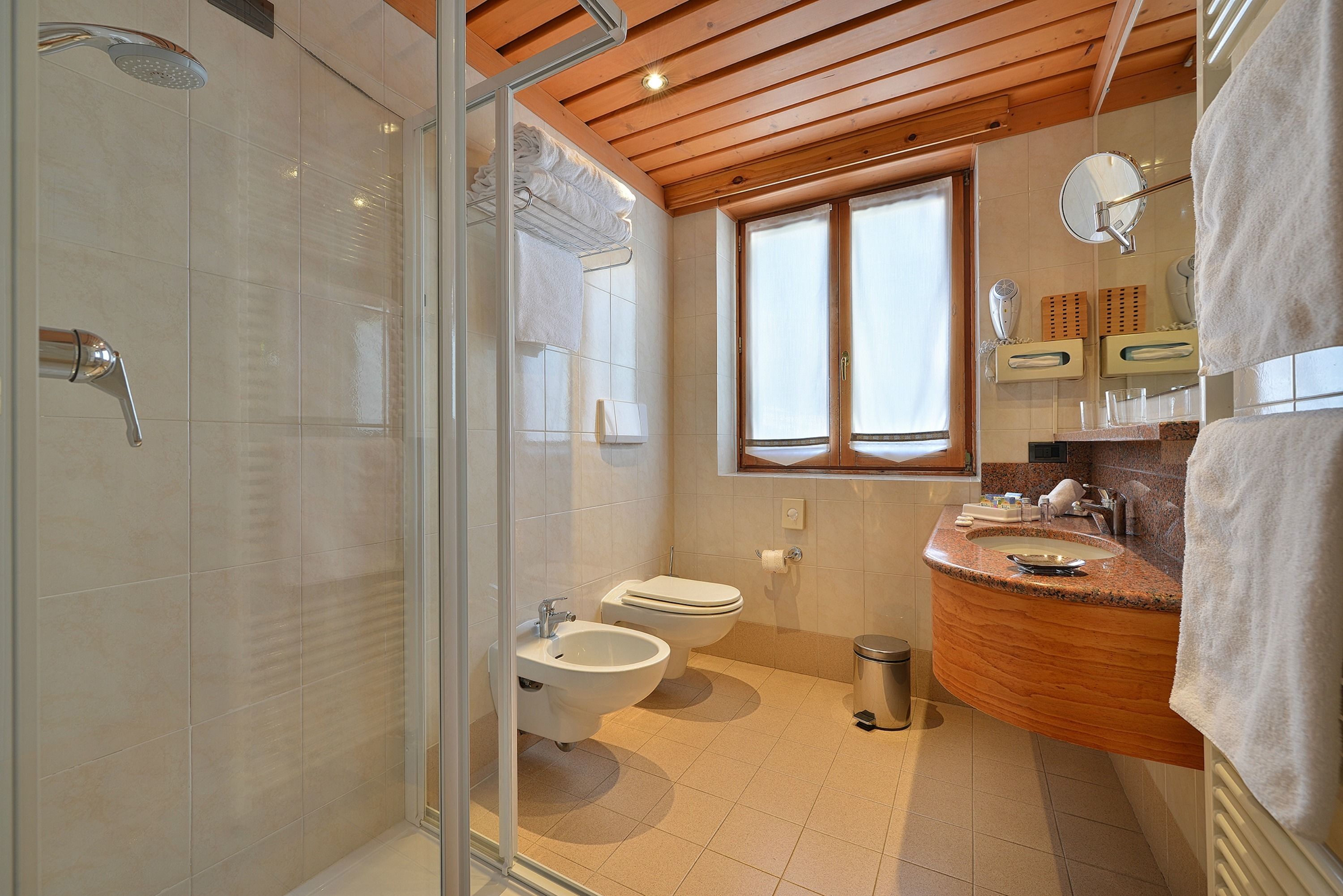 family room | bathroom | free toiletries, hair dryer, bathrobes, slippers