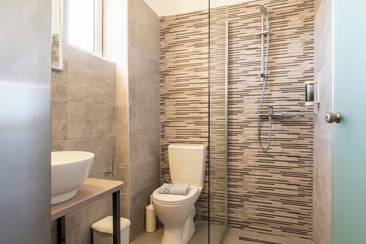 comfort studio | bathroom | shower, rainfall showerhead, hair dryer, bidet