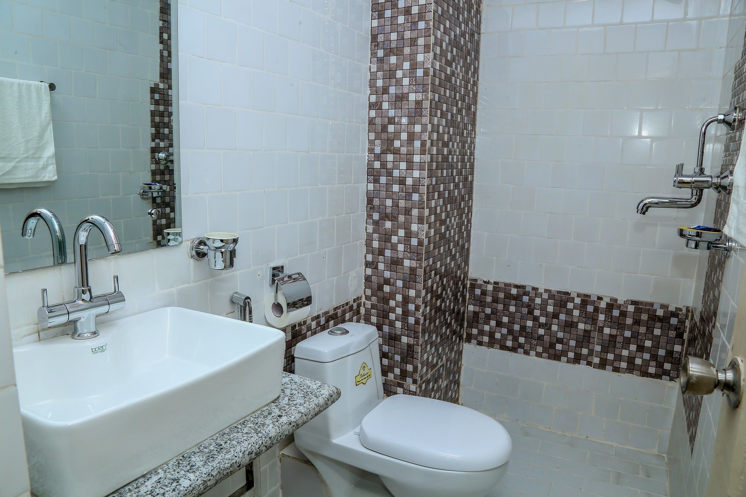 deluxe twin room, 2 single beds, hill view | bathroom | free toiletries, hair dryer, slippers, towels