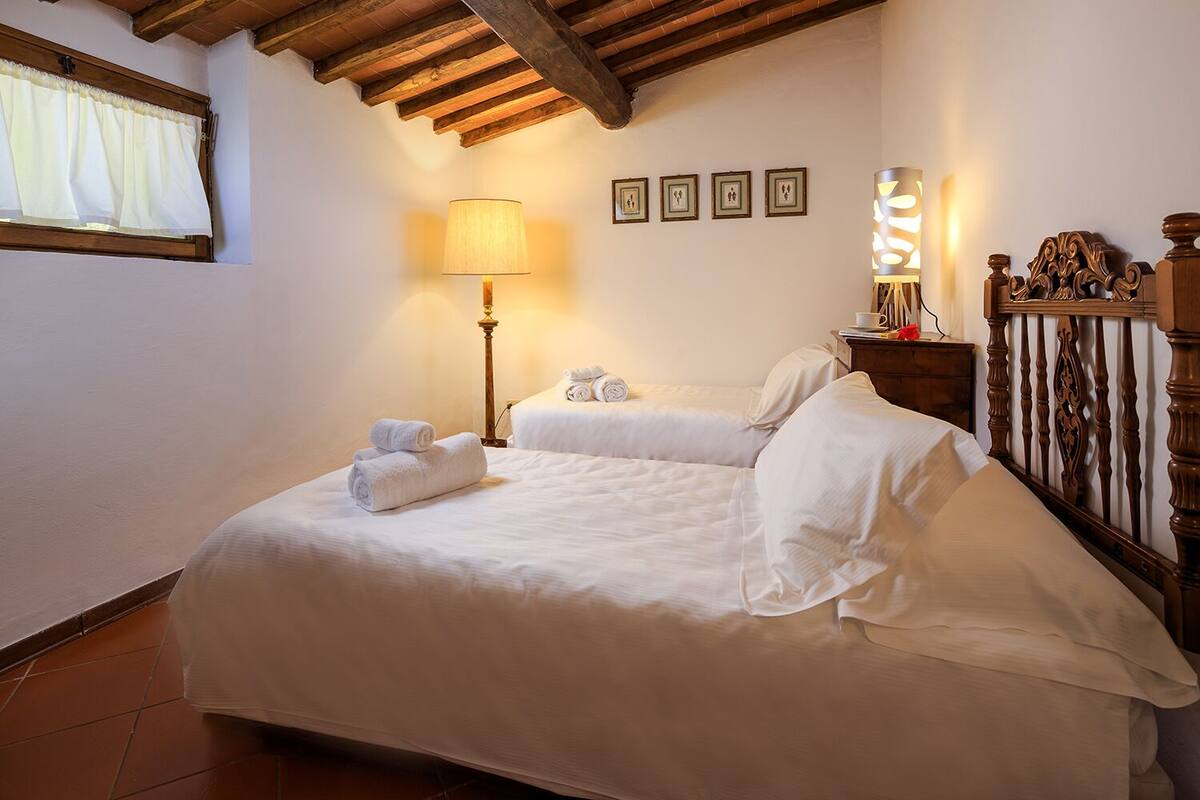 Apartment, 2 Bedrooms (Corbezzolo) | Desk, soundproofing, iron/ironing board (on request), WiFi (free)