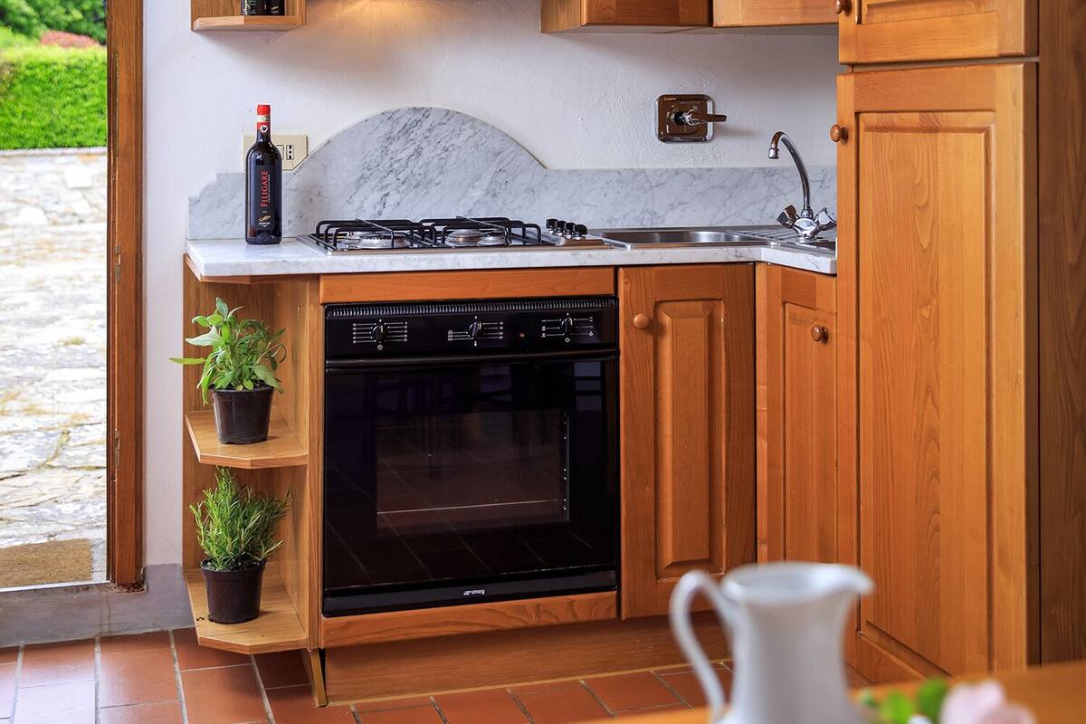 Apartment, 1 Bedroom (Tulipani) | Private kitchen | Coffee/tea maker, full-size fridge, microwave (on request), oven