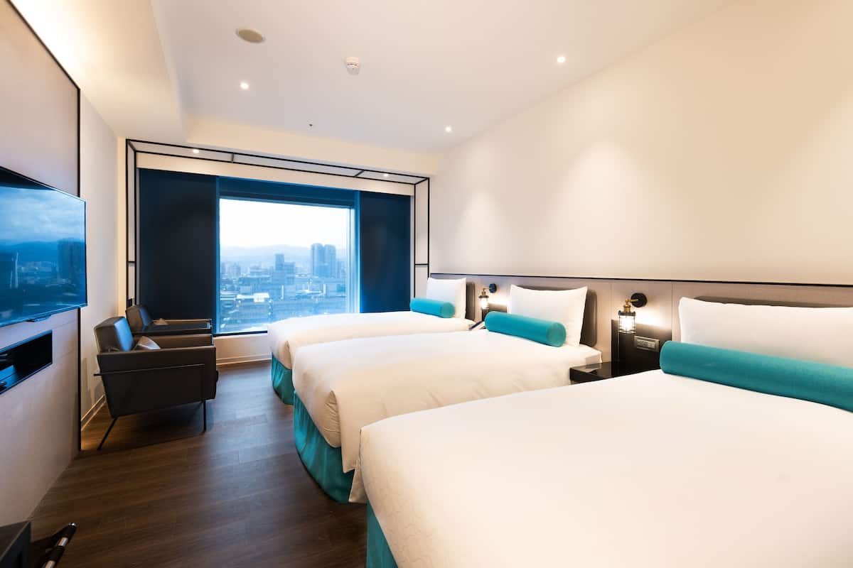 Chambre Familiale, 3 lits une place | Vue de la chambre