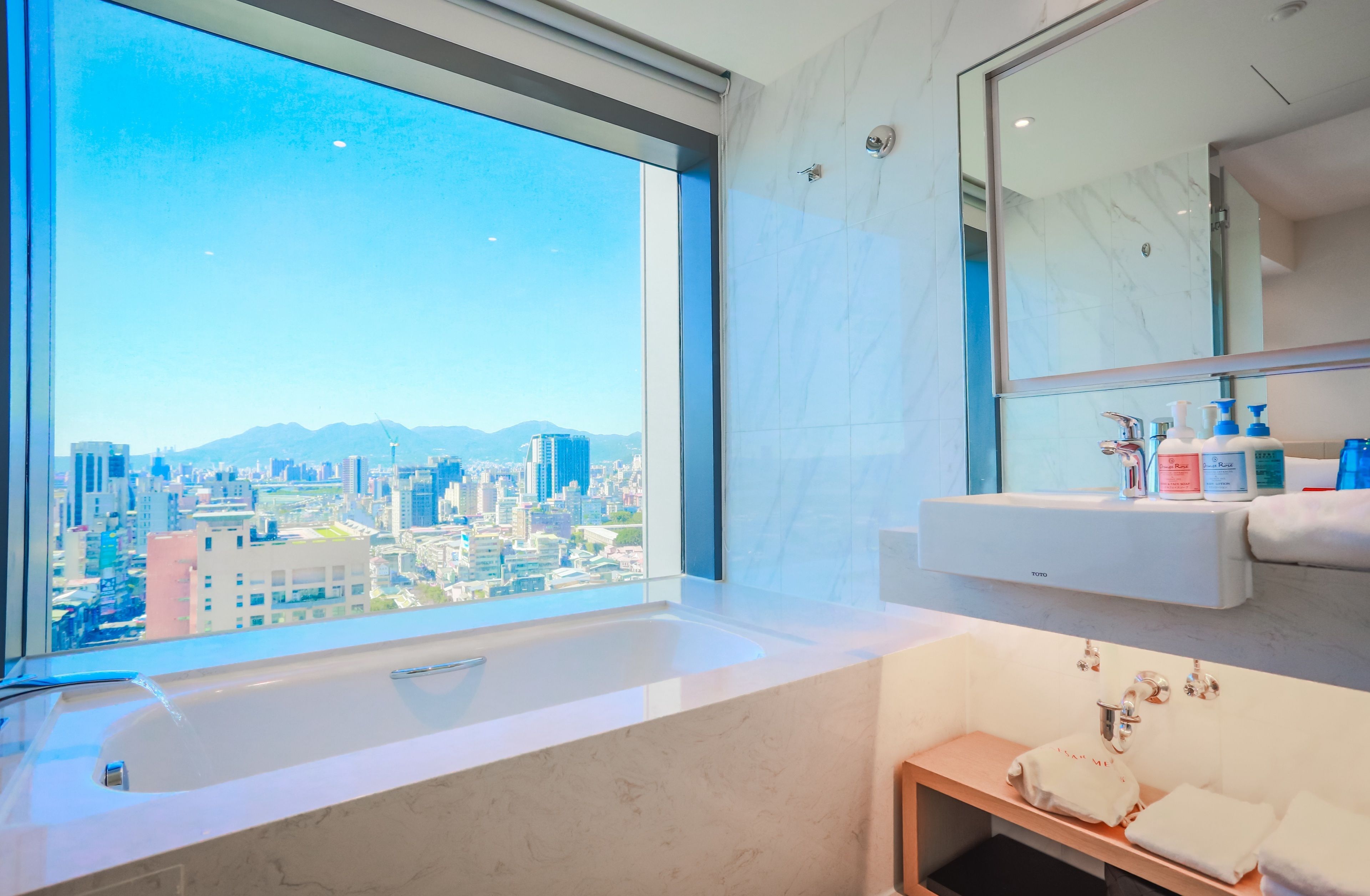 family suite | bathroom | separate bathtub and shower, hair dryer, towels, soap