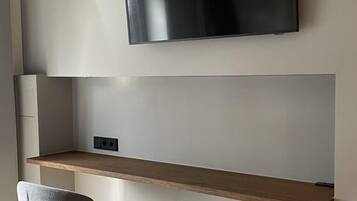 Ropa de cama de alta calidad y tabla de planchar con plancha