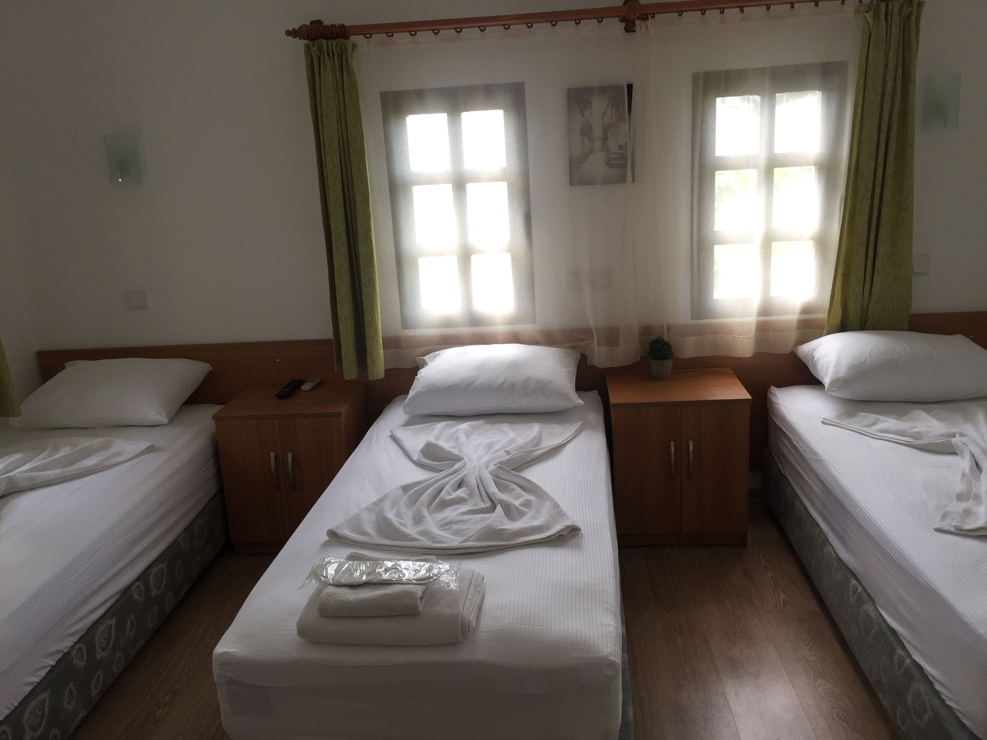 triple room | premium bedding, blackout curtains, iron/ironing board, free wifi