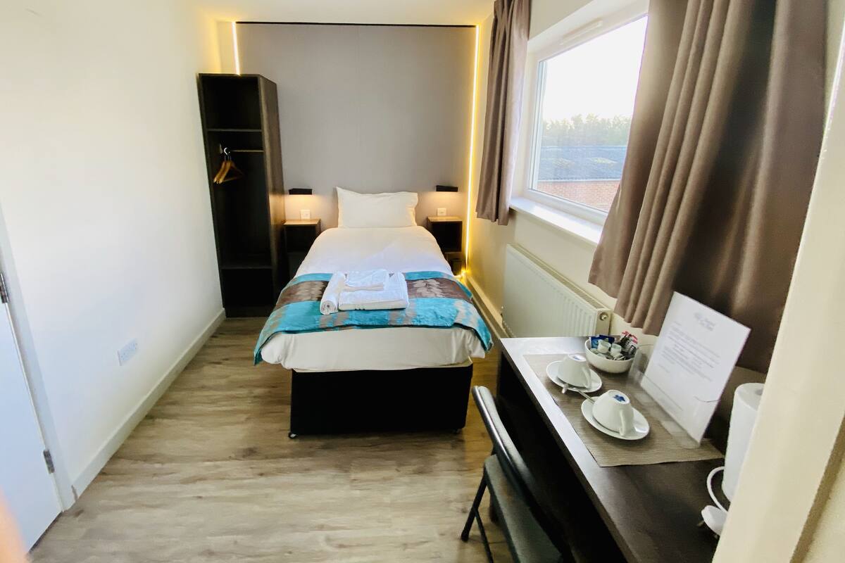 Single Room | Desk, soundproofing, iron/ironing board (on request), cribs (surcharge)