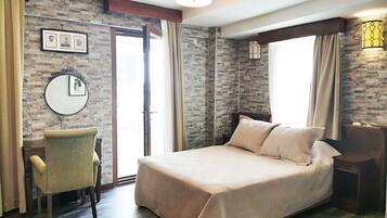Suite familiar | Ropa de cama de alta calidad y minibar