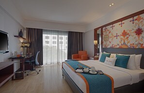 Ropa de cama de alta calidad, minibar, caja fuerte y escritorio