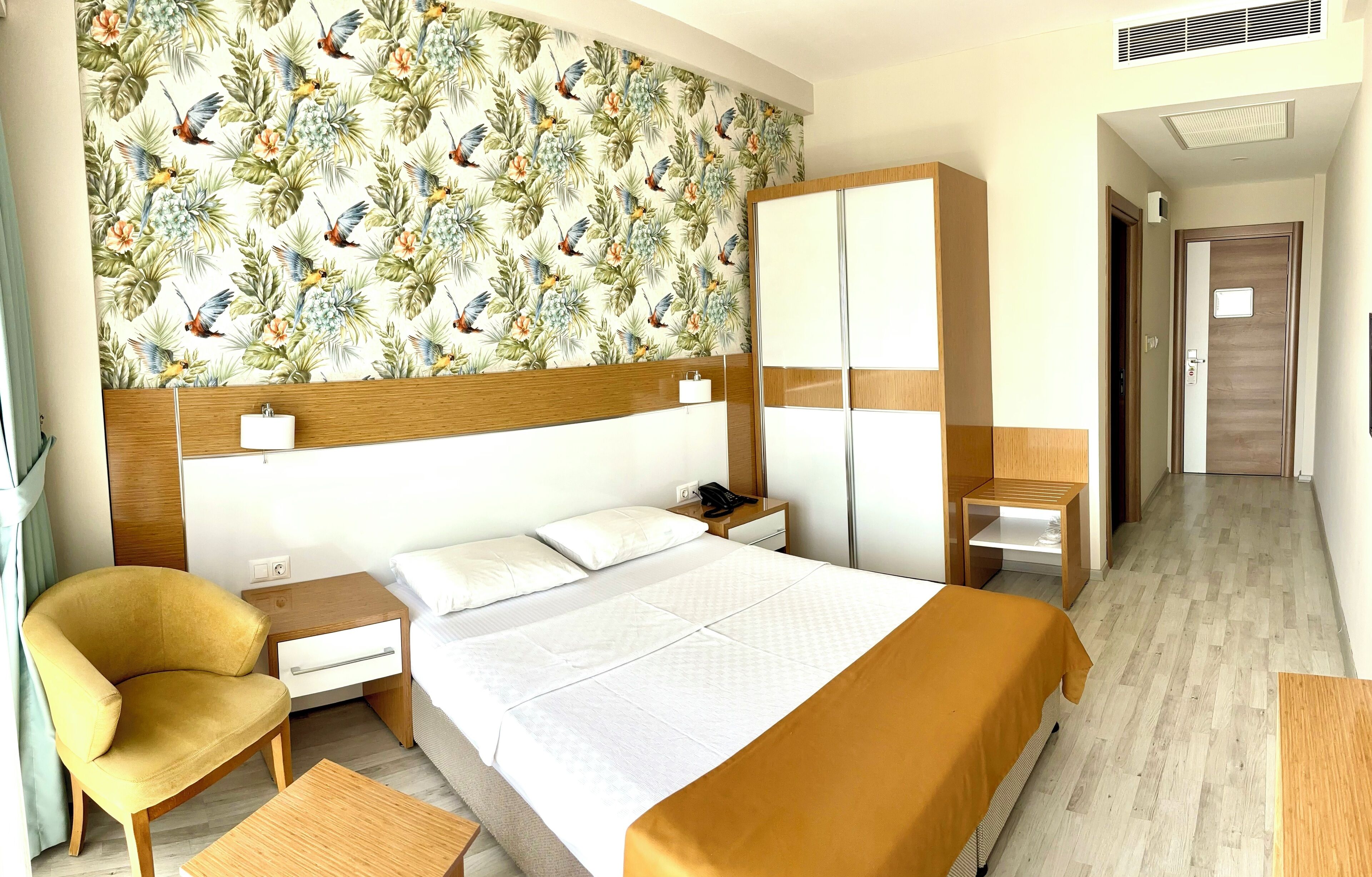 standard double room, sea view | minibar, in-room safe, desk, soundproofing