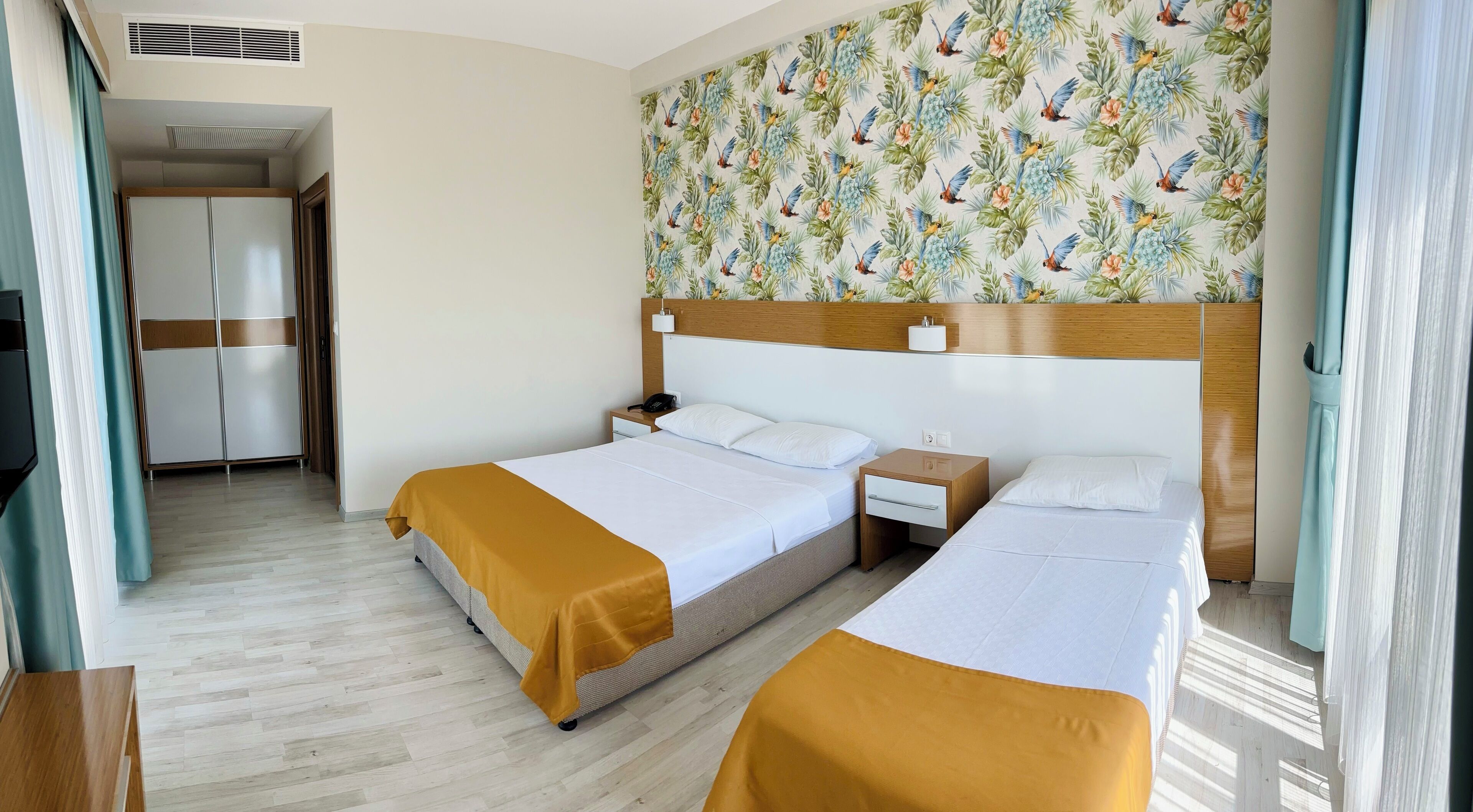 family room, sea view | minibar, in-room safe, desk, soundproofing