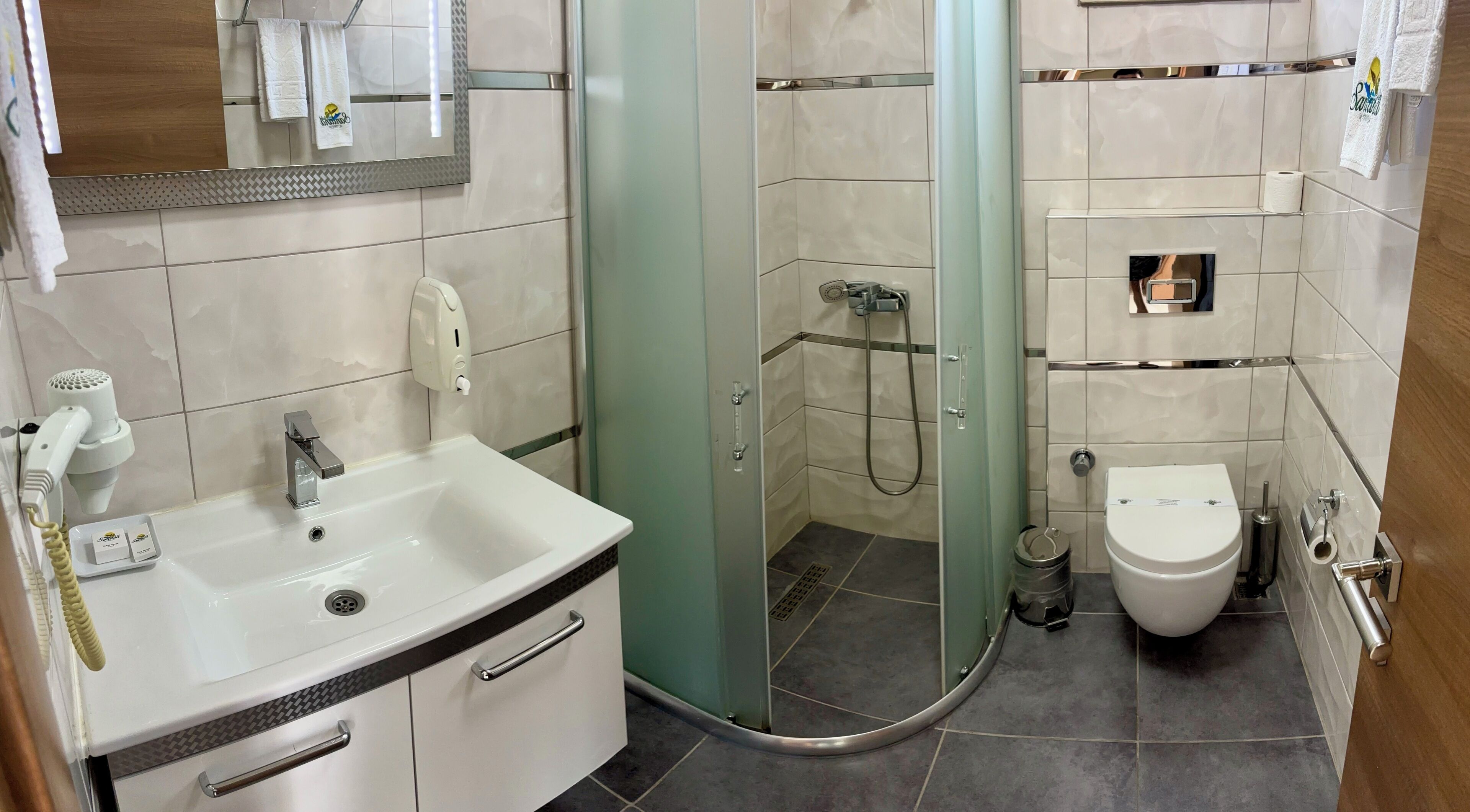 family room, sea view | bathroom | shower, free toiletries, hair dryer, slippers