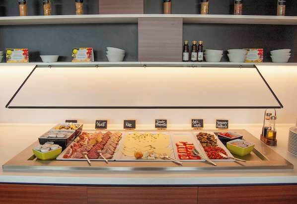 Daily buffet breakfast (EUR 18 per person)