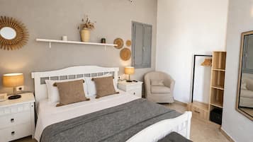 Honeymoon Bungalow | In-room safe, individually decorated, individually furnished, desk