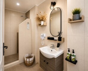 Honeymoon Bungalow | Bathroom | Shower, free toiletries, hair dryer, slippers - Mare Nostrum Santo (Santorini)