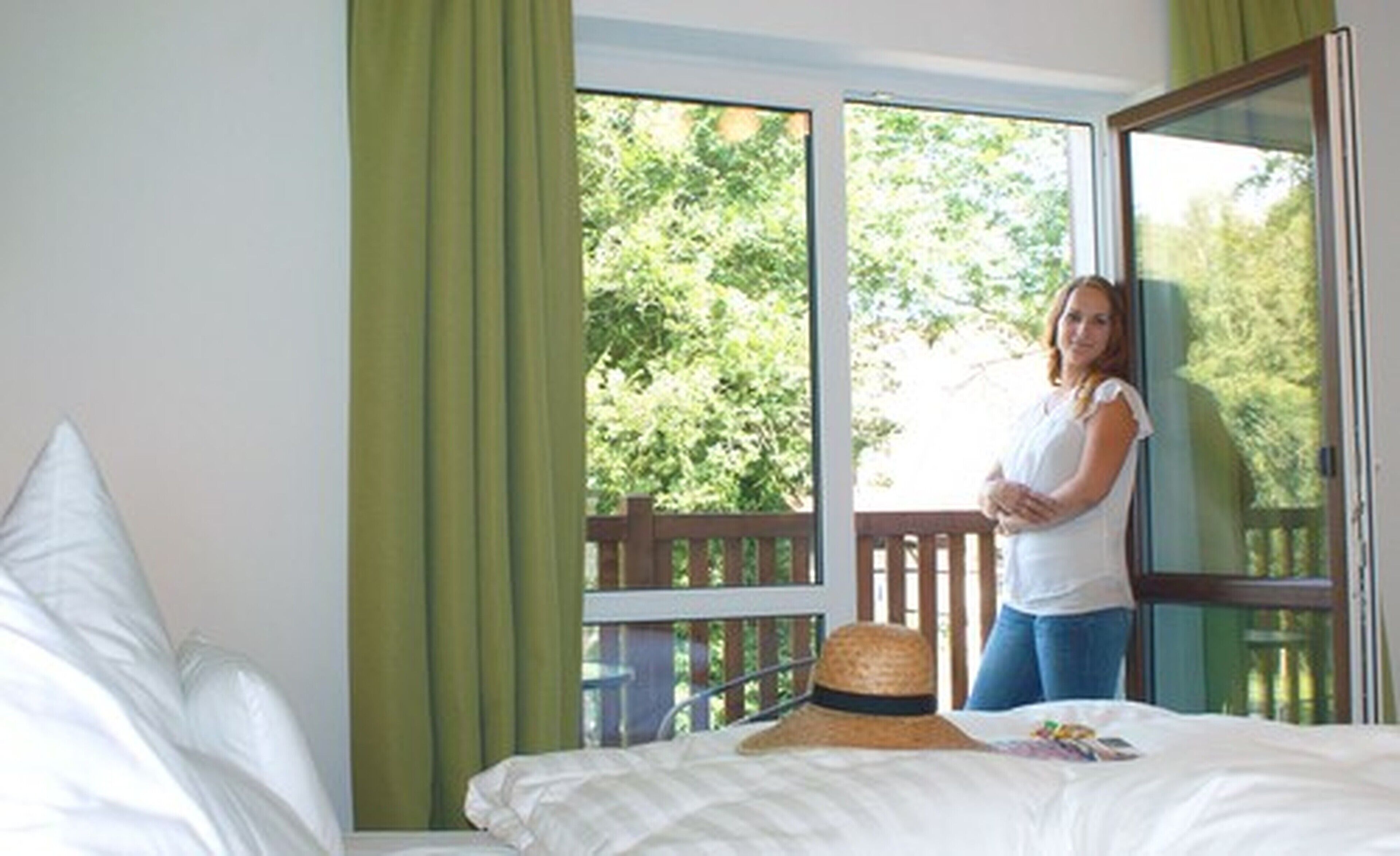 comfort double room, balcony, garden view | down duvets, in-room safe, desk, blackout curtains