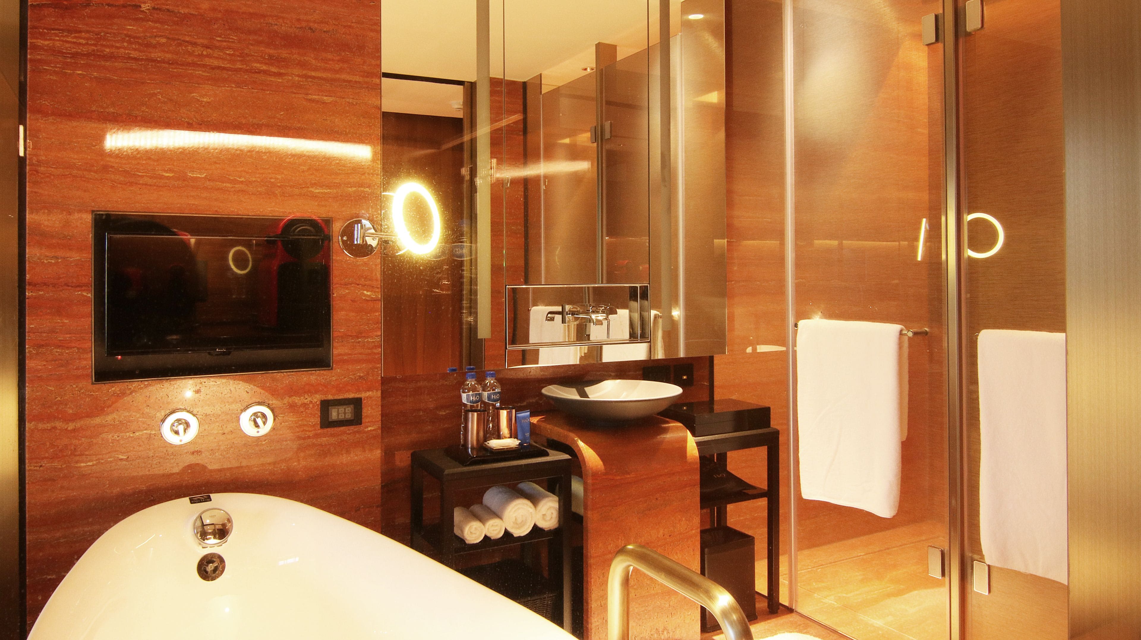 separate bathtub and shower, deep-soaking bathtub