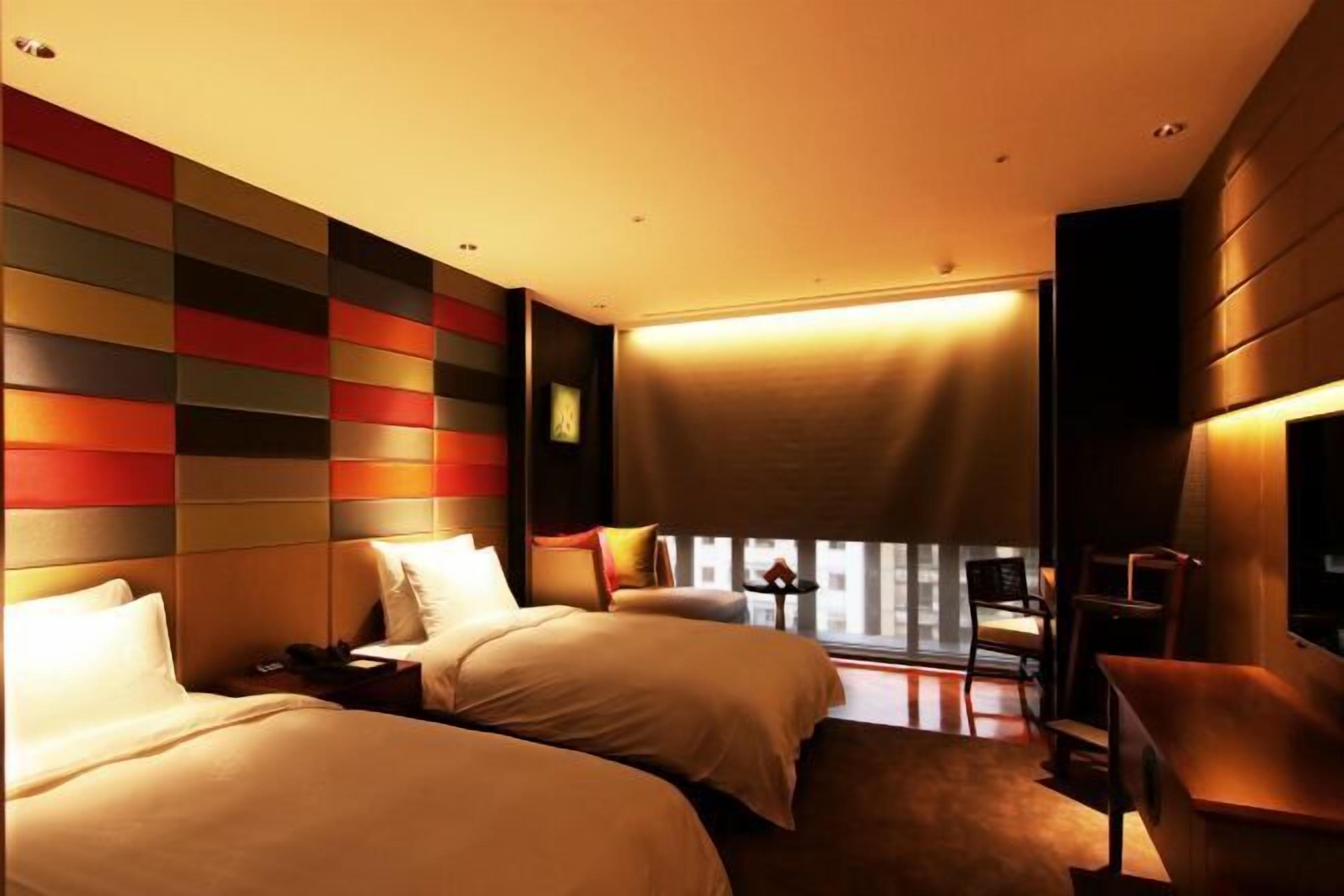 高档床上用品、羽绒被、迷你吧（备有免费物品）、客房内保险箱