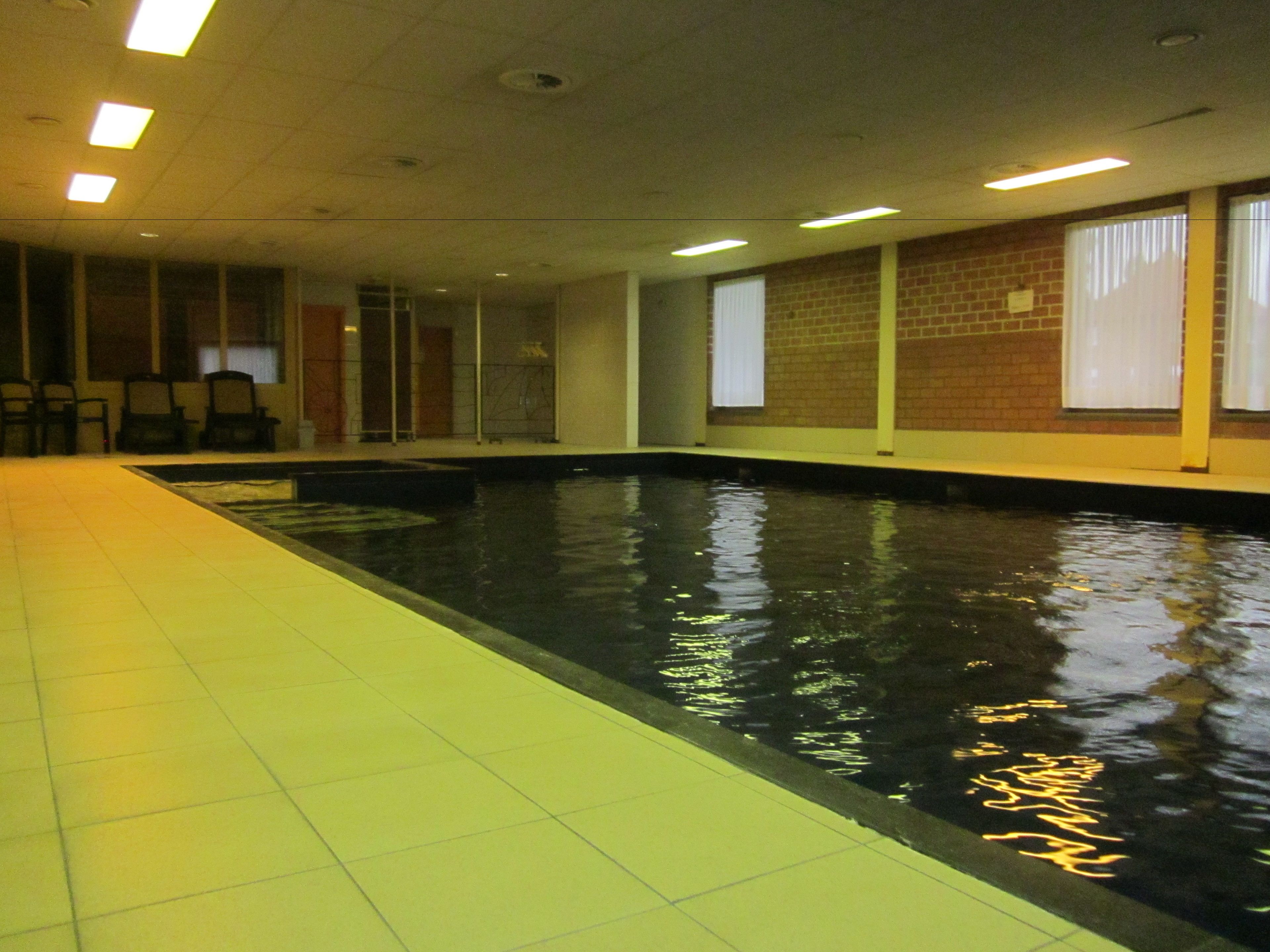indoor pool, pool loungers