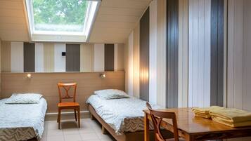 Desk, blackout curtains, rollaway beds, free WiFi