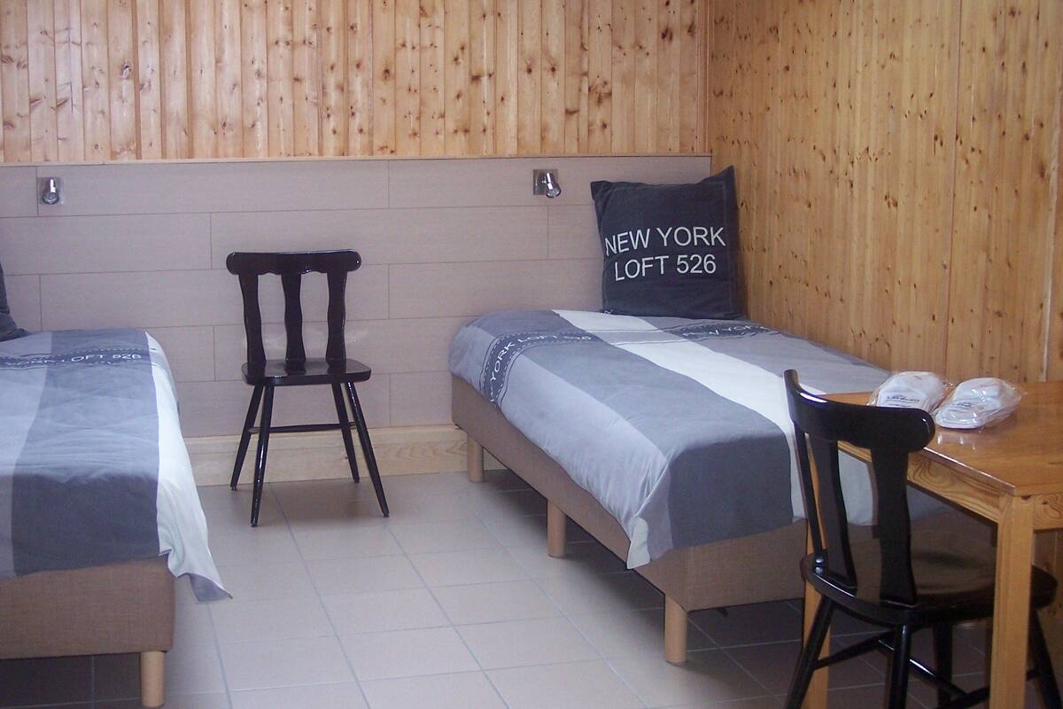 Desk, blackout curtains, rollaway beds, free WiFi