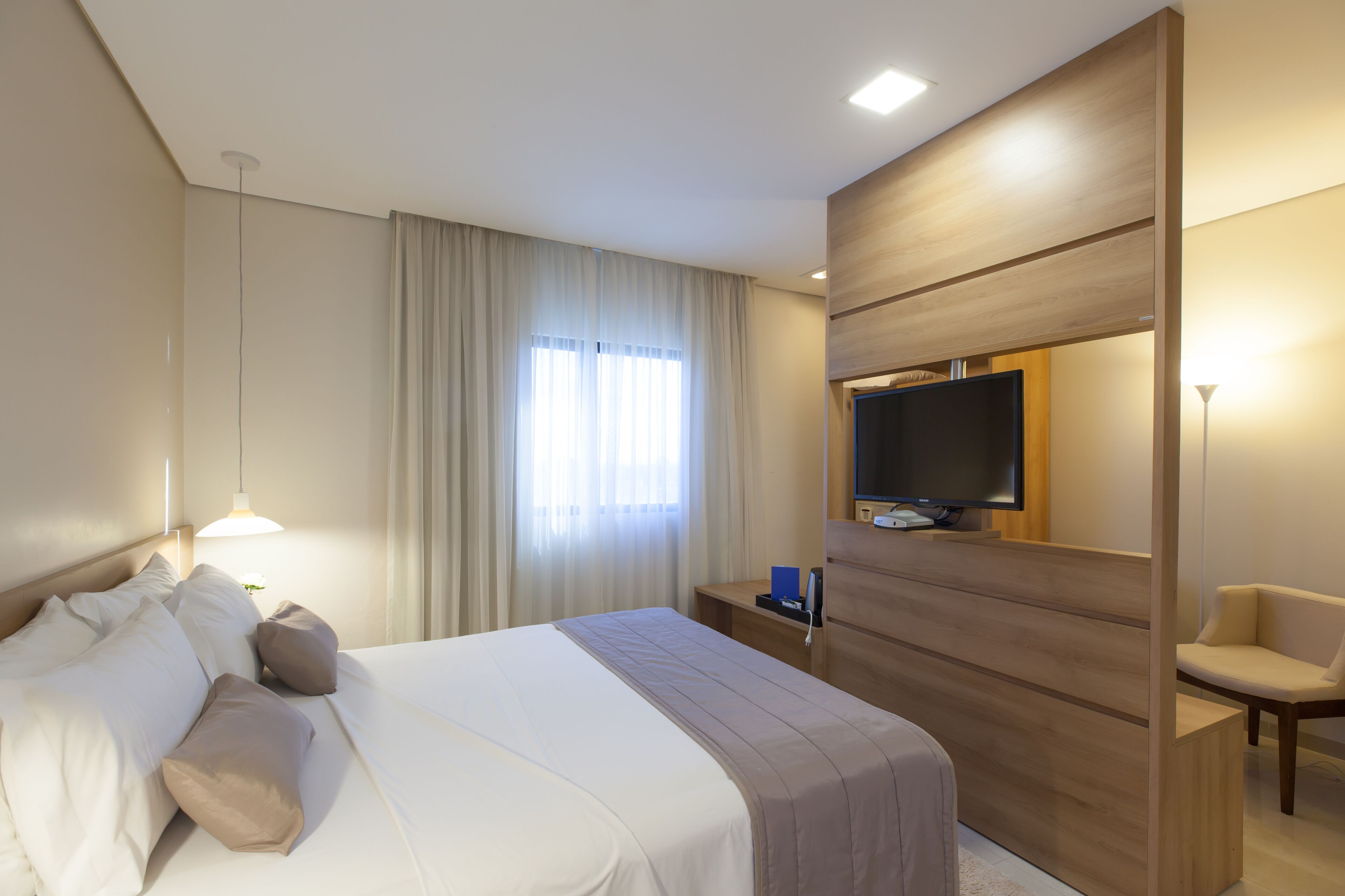 deluxe double room | pillow-top beds, minibar, in-room safe, desk
