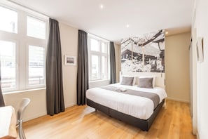 Ropa de cama de alta calidad y minibar