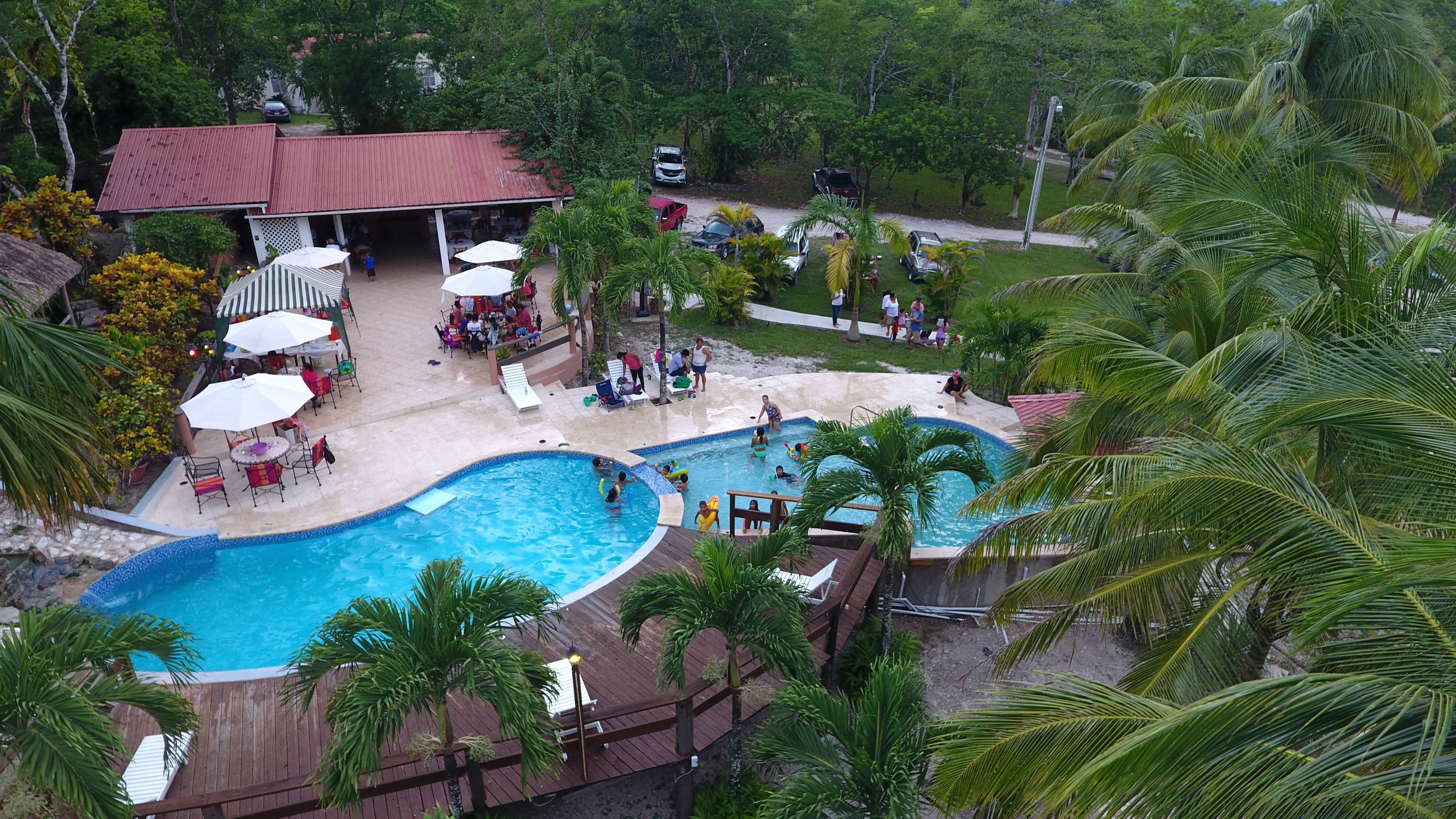 outdoor pool, pool umbrellas, pool loungers