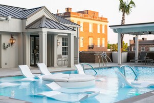 Outdoor pool, open 5:00 AM to 10:00 PM, sun loungers