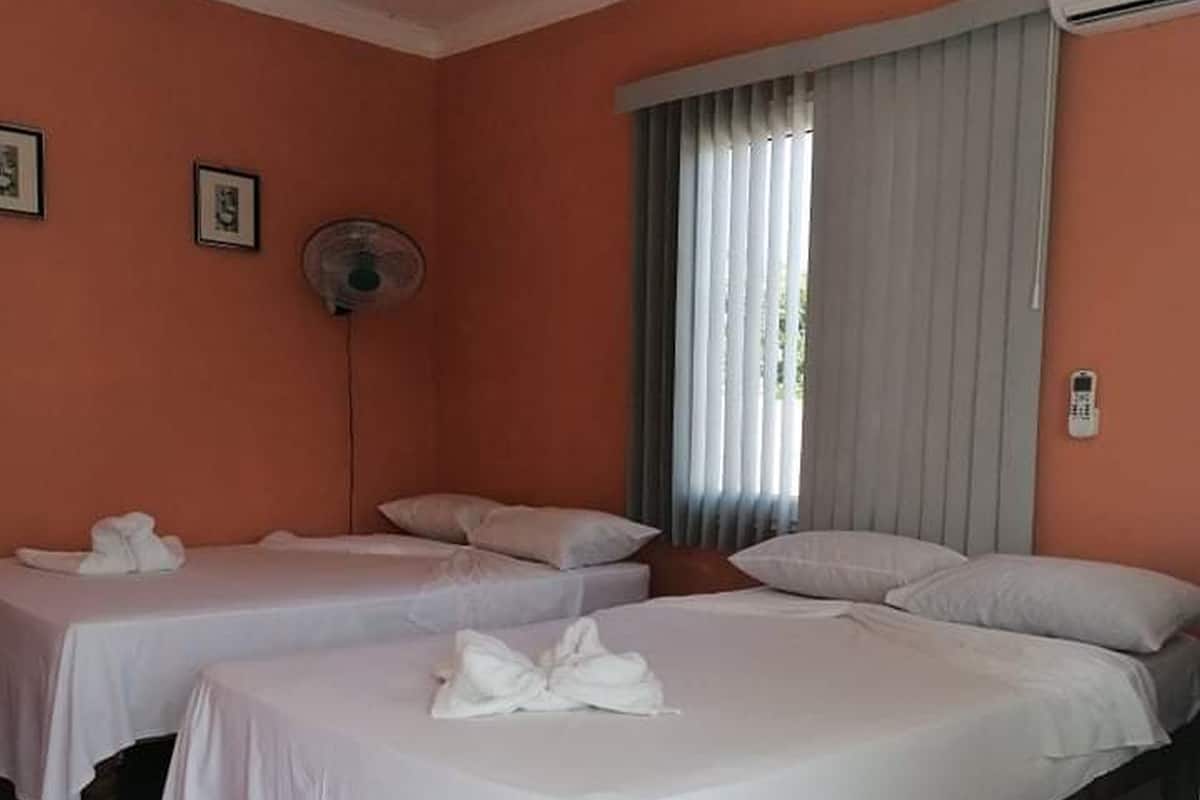 Minibar, coffres-forts dans les chambres, fer et planche Ă repasser