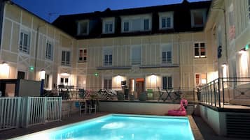 Seasonal outdoor pool, open 10:00 AM to 8:00 PM, sun loungers