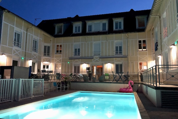 Seasonal outdoor pool, open 10:00 AM to 8:00 PM, sun loungers