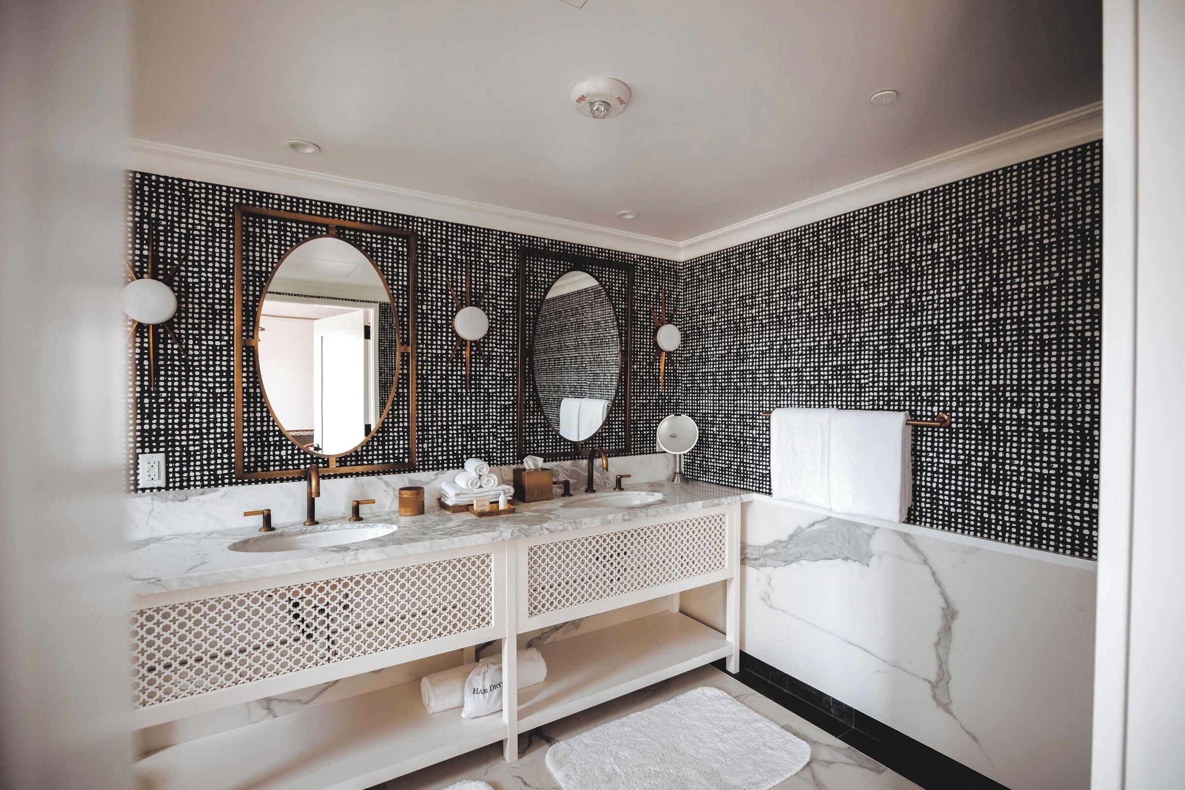 Designer toiletries, bathrobes, slippers, towels