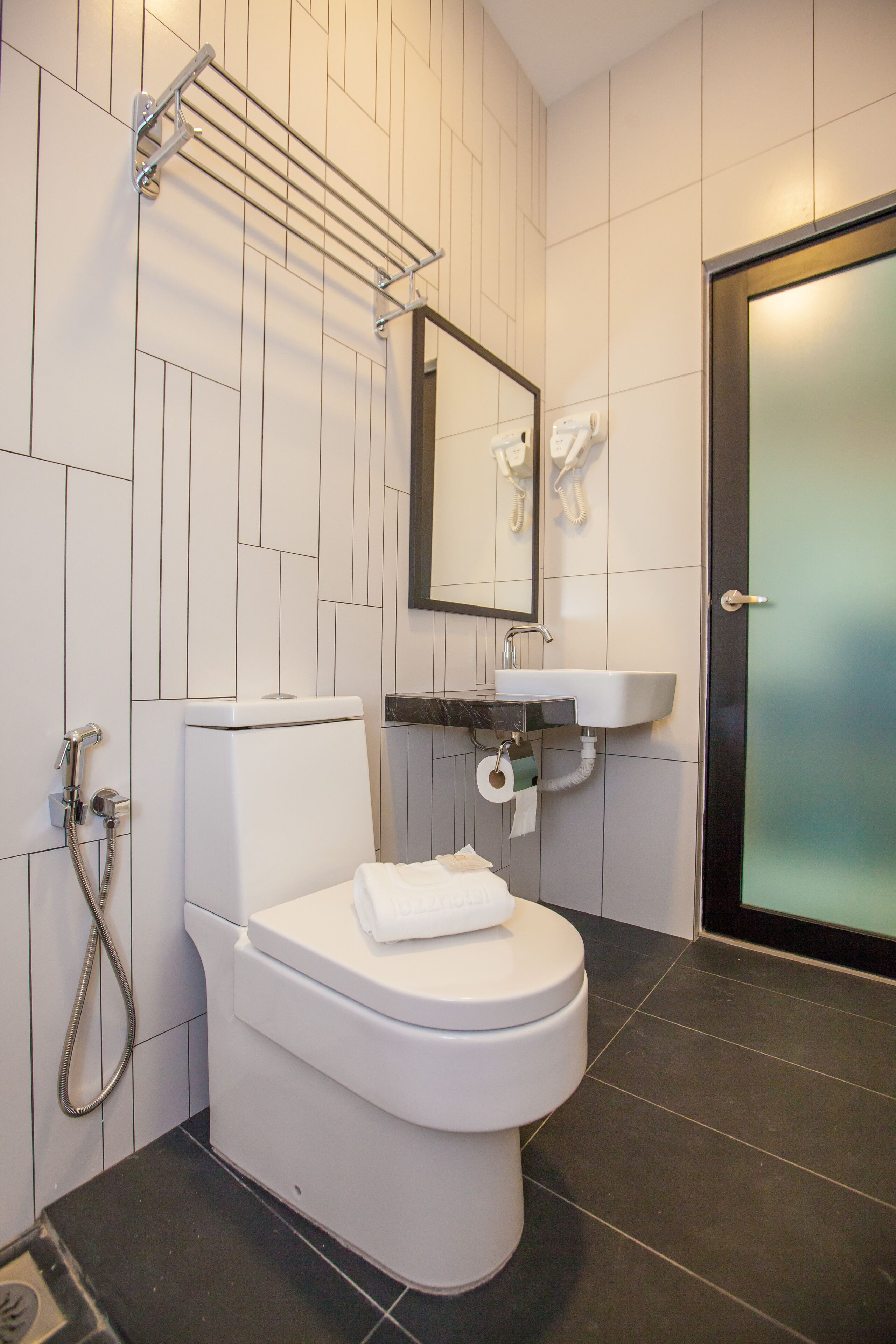 family quad room | bathroom | shower, free toiletries, bidet, towels