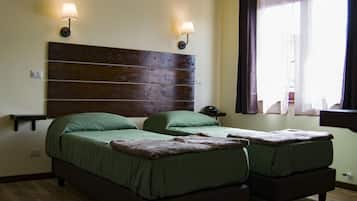 Triple Room | Hypo-allergenic bedding, individually furnished, desk, blackout drapes