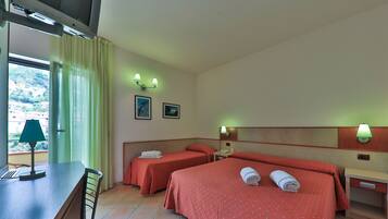 Triple Room | In-room safe, individually decorated, individually furnished, desk